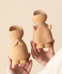 Cute little man looking up at candlestick modern simple ceramic vase high-end home decoration ornaments