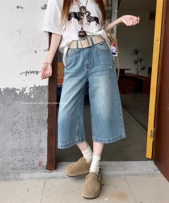 Real shot of American retro high street denim trousers for women in summer high waist ripped wide-leg trousers