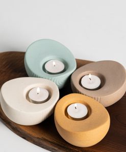 Modern simple four-color Yuanbao ceramic candle candlestick desktop coffee table TV cabinet soft decoration ornament