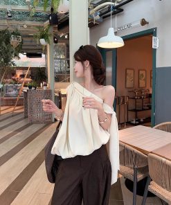 Real shot~French irregular slanted shoulder top for women's sleeveless outerwear design sense streamer vest suspender summer