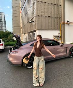 Real shot of halter neck and neck strap top for women heavy industry ink splashing old retro ripped jeans floor trousers