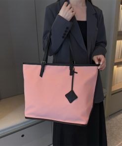 Spring and summer solid color fashion ladies one-shoulder underarm bag large capacity oblique span high-quality texture commuting tote bag