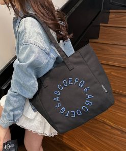 Embroidered letter canvas bag women's large capacity one-shoulder tote bag niche versatile commuter tote bag