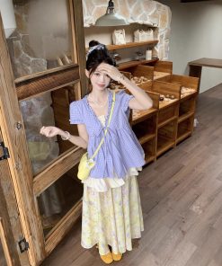 Real shot of summer purple fake two-piece top + oil painting Korean large skirt hem floral skirt suit