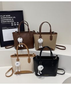 Contrasting color versatile hand-held bucket bag for women's spring simple and high-end niche one-shoulder crossbody bag