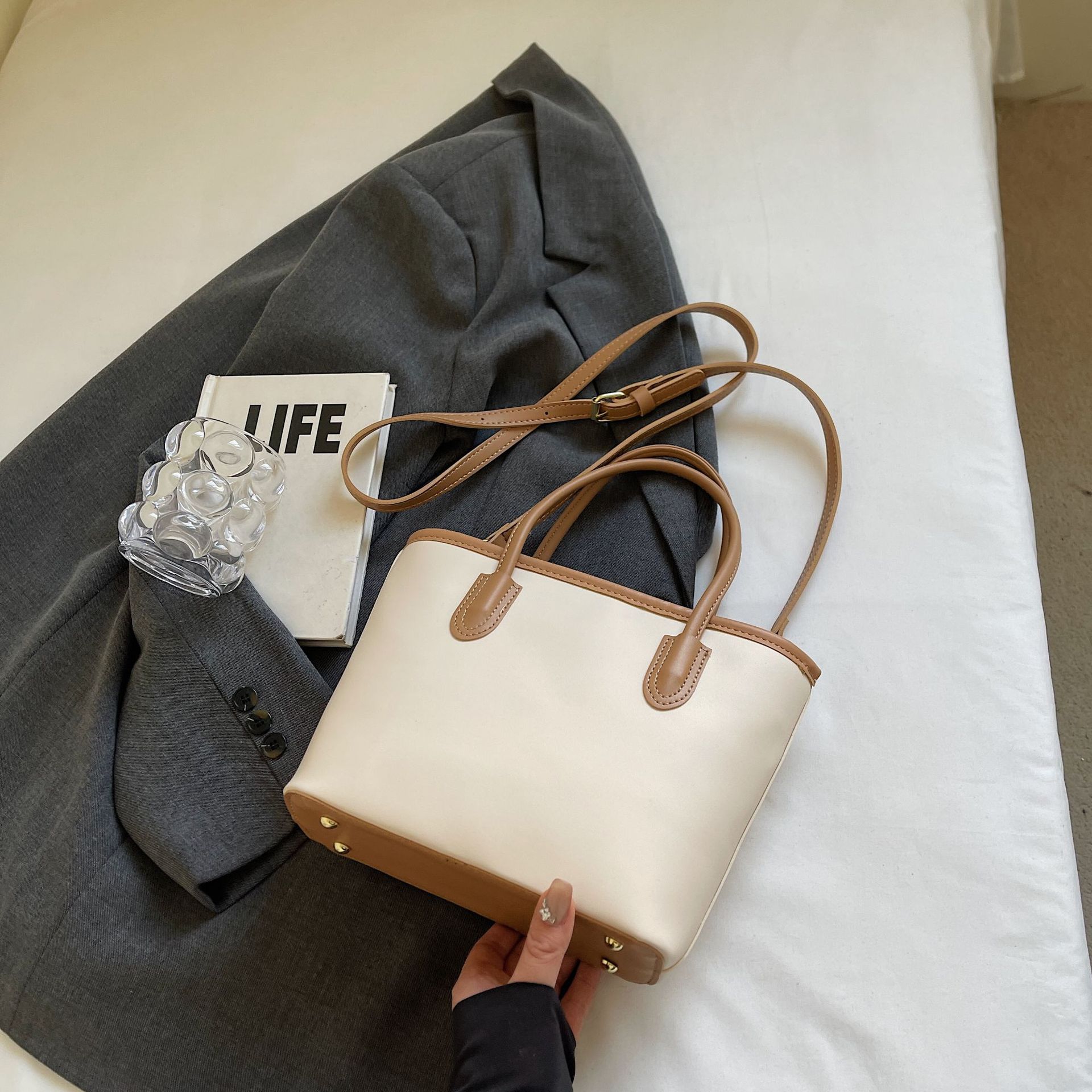 Contrasting color versatile hand-held bucket bag for women's spring simple and high-end niche one-shoulder crossbody bag - Image 14