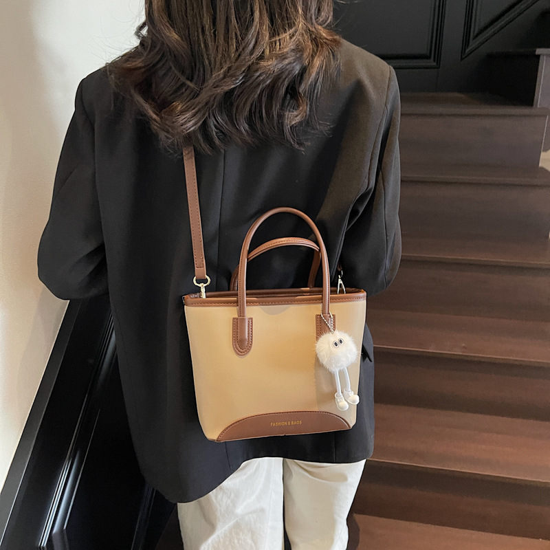 Contrasting color versatile hand-held bucket bag for women's spring simple and high-end niche one-shoulder crossbody bag - Image 3