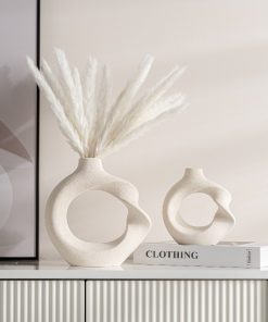 Modern minimalist ceramics, twisted round vases, home decoration ornaments style